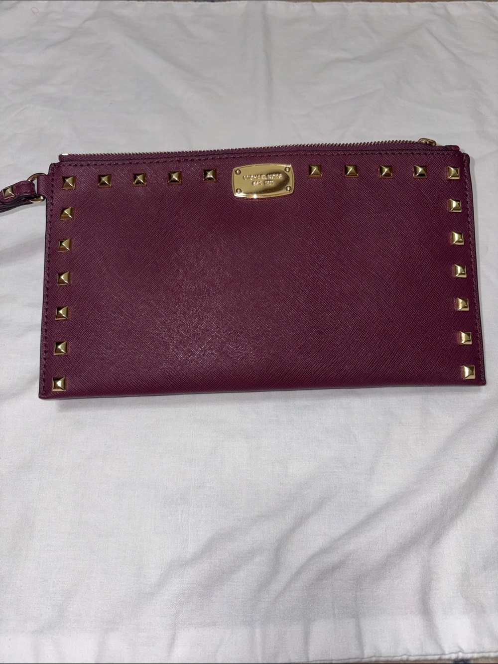 Michael Kors Wine Red Saffiano Wristlet with Gold Studs